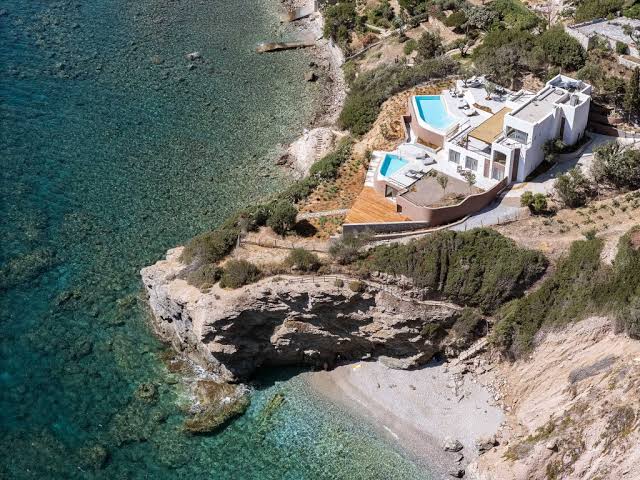 Coastal luxury villa above a Greek bay
